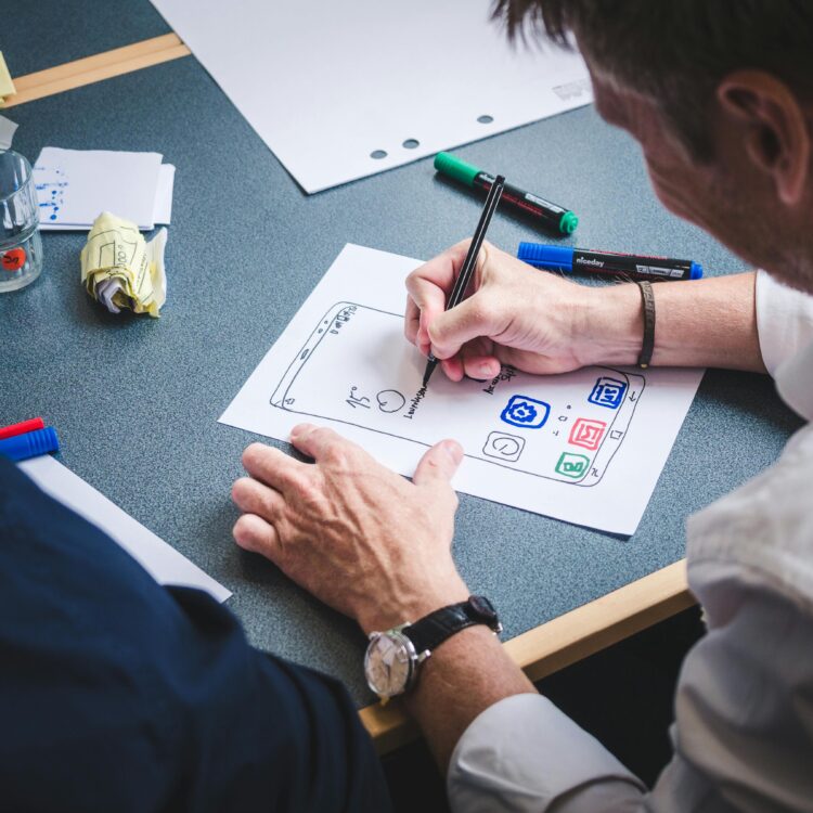 men_working_on_webiste_design